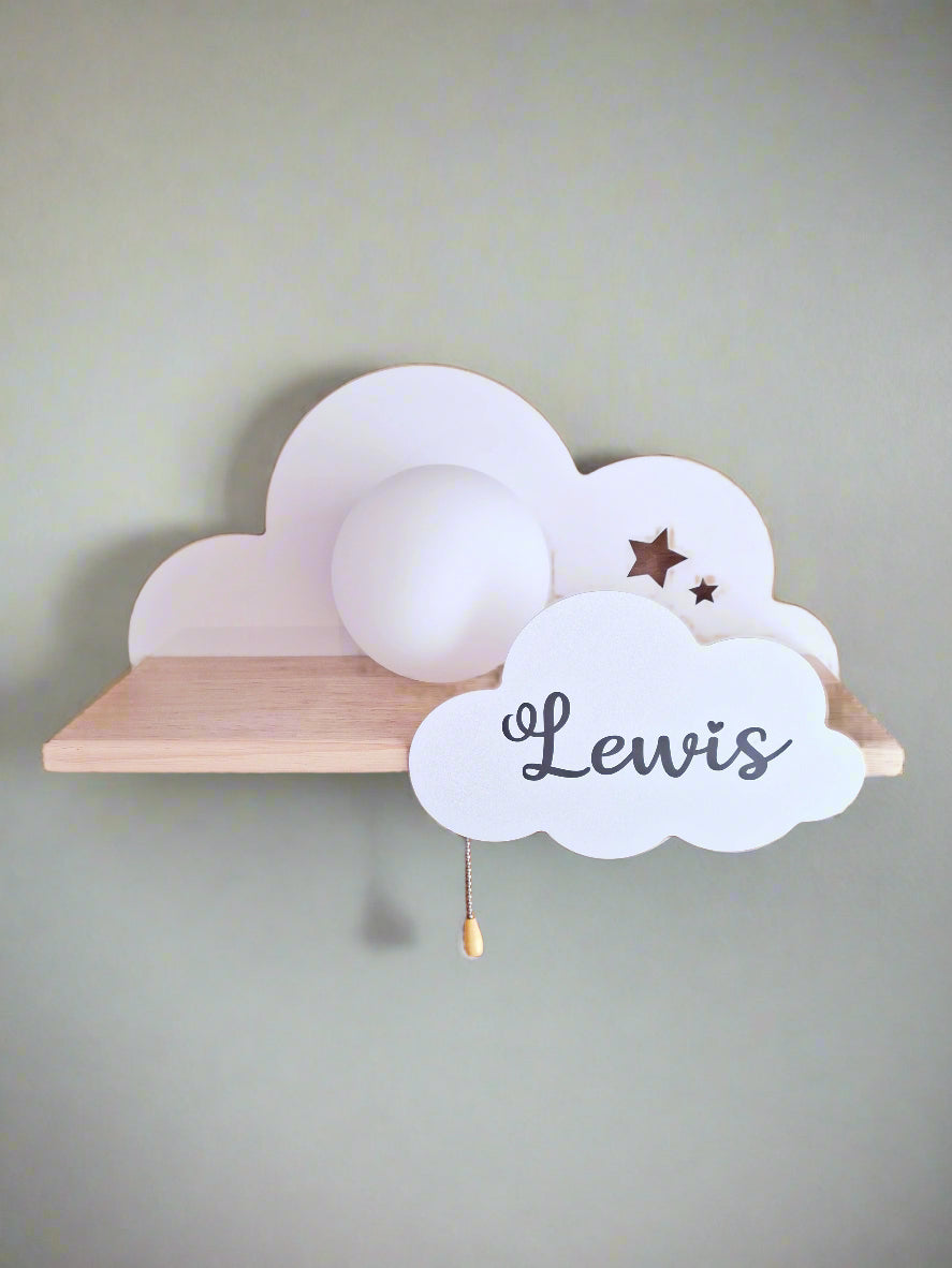 Personalised cloud wall light with baby name - handcrafted white nusery shelf with soft LED glow.