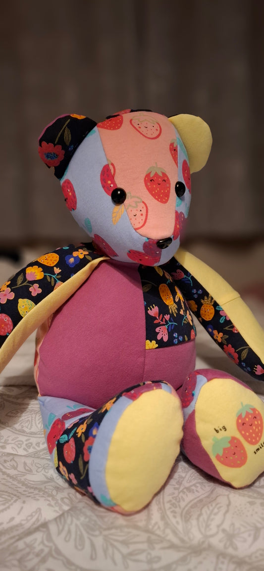 Custom handmade memory bear created from customer's clothing, sitting pose, soft fabric and sentimental design, made in the UK by Baby Bundles Ltd.